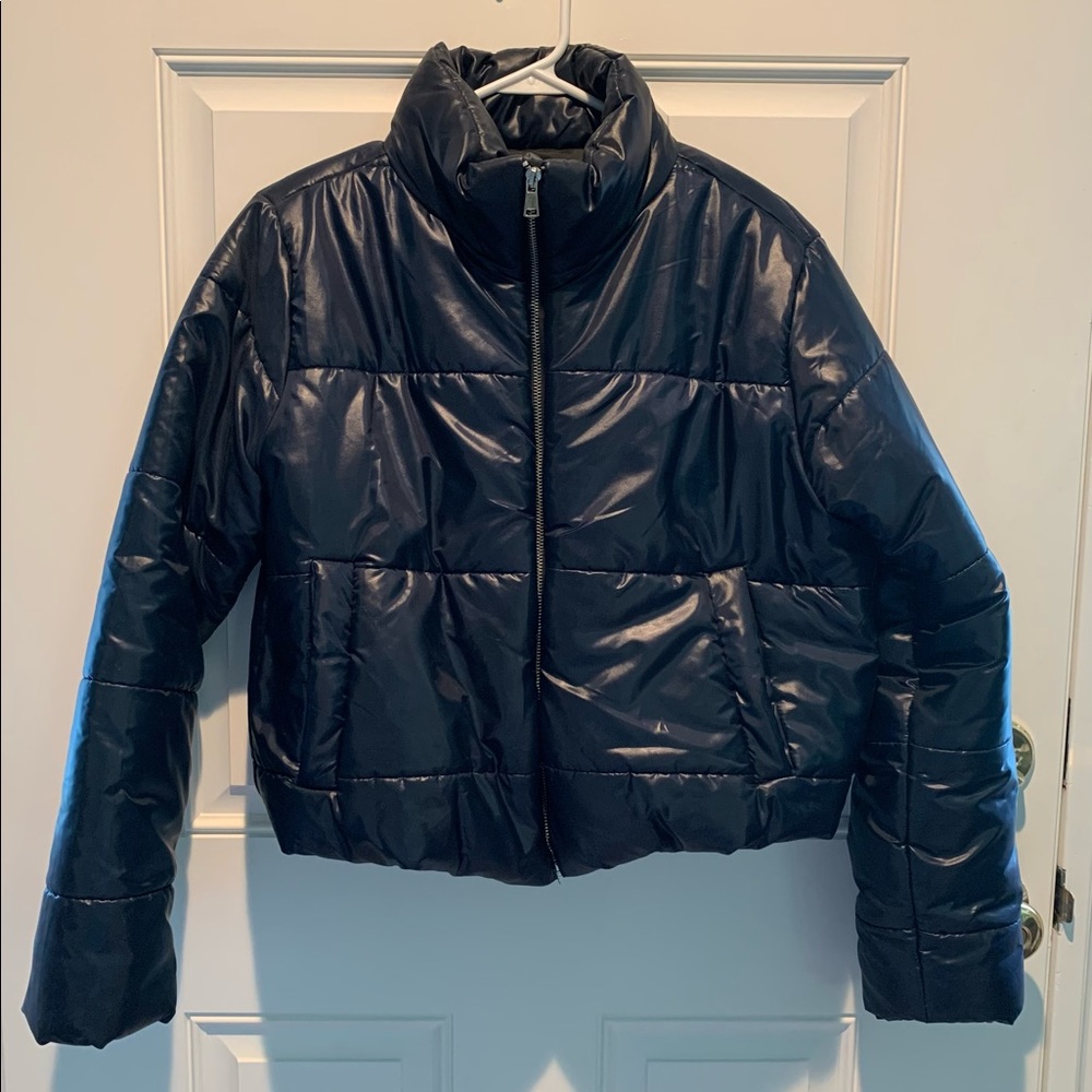 Rising navy blue shiny puffer jacket.